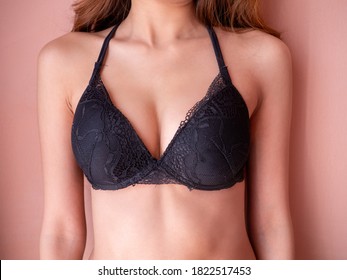 Boobs Of Young Asian Woman In Black Bra