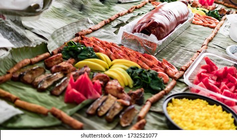 Boodle fight style of eating. A traditional filipino way of eating together with family and friends