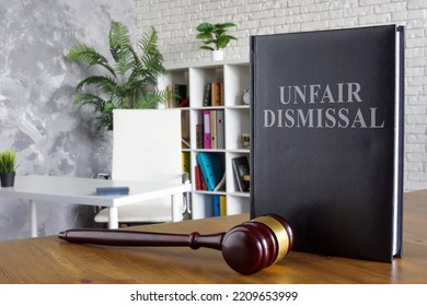 Book About Unfair Dismissal And Gavel Near.