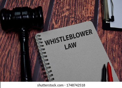 Book About Whistleblower Law Isolated On Wooden Table.