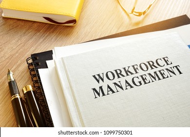 Book About Workforce Management And Pen.