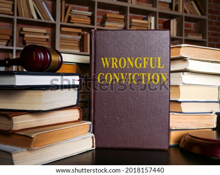 The book about Wrongful conviction and gavel.
