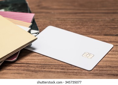 Book Account Bank With Blank Credit Business Card On Office Wooden Table.