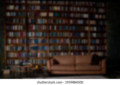 Book background. Selective focus. Blurred texture of old books. Bookshelves in the library.