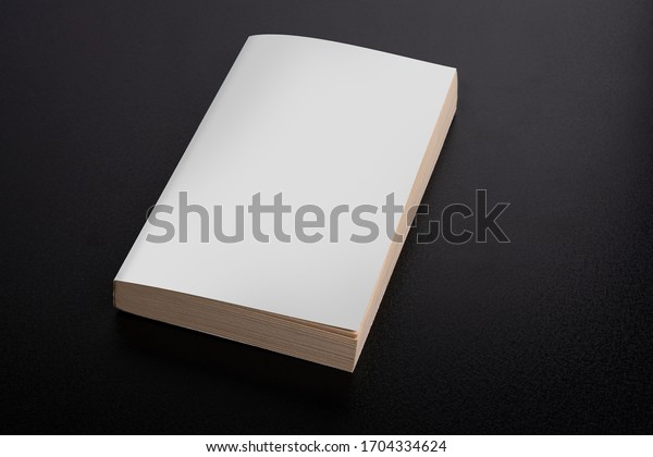 Book with\
blank cover on black background, editable mock up template ready\
for your design, clipping path\
included