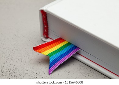 Book With Bookmark And Rainbow Ribbon Of LGBT Pride.