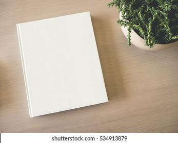 Book Cover Mock Up Template On Table With Plant Decoration