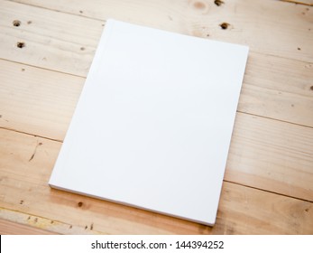 Book Cover White On Wood Table