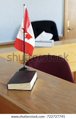 Book and flag at court witness stand
