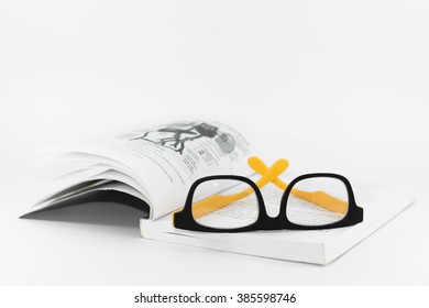 Book And Glasses