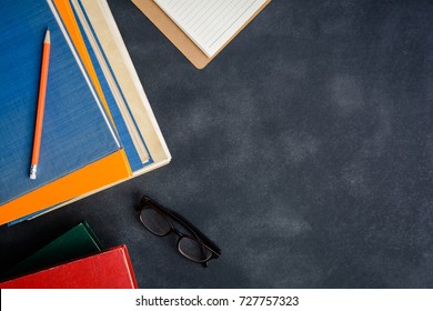 Book Glasses And Pencil On The Desk With Study And Education Concept. Selective Focus