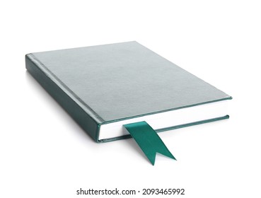 Book with green bookmark on white background