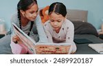 Book, help and siblings bedroom with story, reading and learning about storytelling and literature in home. Education, study and kids together with support, development and fantasy tale for language