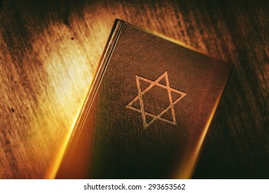 The Book of Judaism. Ancient Prayer Book with Judaism Star of David Symbol on Cover.