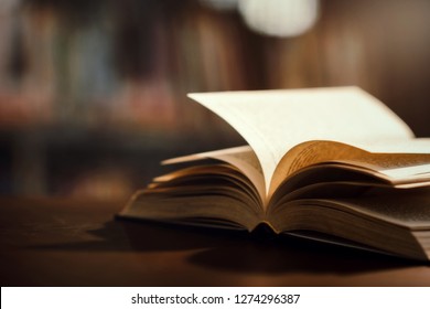Book in library with open textbook,education learning concept - Shutterstock ID 1274296387