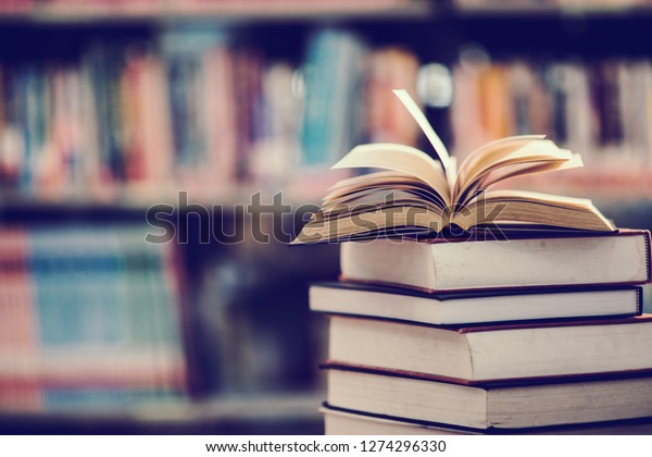 Book in library with open textbook,education learning concept