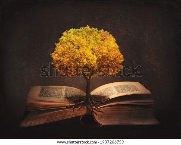 Book of life, knowledge, wisdom - old\
tree and its roots on open pages of a magic book;\
