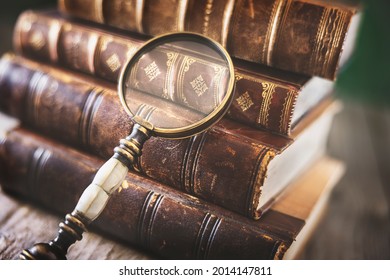 Book and magnifying glass concept for education, knowledge and searching for information - Powered by Shutterstock