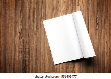 book mock up on wood background - Shutterstock ID 556408477