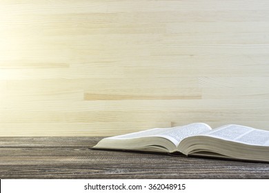 Book on a wooden table. Book is a dictionary. Toned - Shutterstock ID 362048915