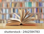 book with open pages, close up, books on the shelf in school, open book on wooden table. back to school concept, High quality book photography, Best Book Photo