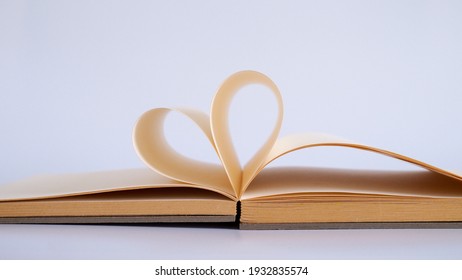 A Book Opened With Heart Shape