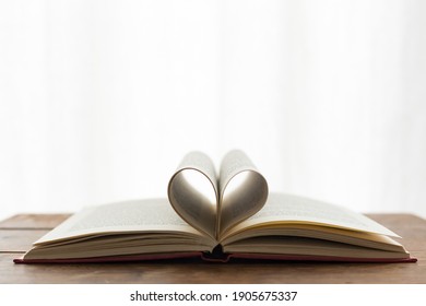 A Book With Pages In The Shape Of A Heart