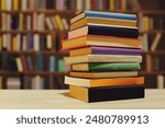 book, pile of old books on wooden shelves,stack of books on wooden table in library, stack of books in the store, blurred background, school, education, library, bookshop,