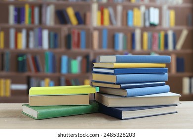 book, pile of old books on wooden shelves,stack of books on wooden table in library, stack of books in the store, blurred background, school, education, library, bookshop, - Powered by Shutterstock