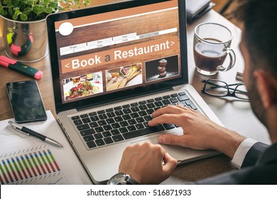 Book A Restaurant. Man Making An Online Restaurant Reservation, Office Background