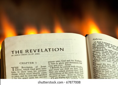 The Book Of Revelation With Fire Burning In The Background