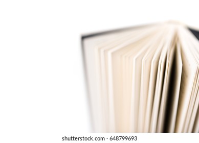 Book Spine And Pages Against An All White Seamless Studio Background