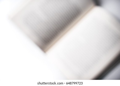 Book Spine And Pages Against An All White Seamless Studio Background