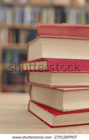 Book stack on the desk in public library, 