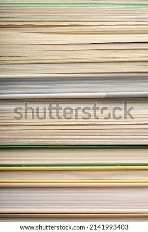 Book stack texture background. Old magazine edges close up, journal pile, detailed book edge, vintage comicbook pack, waste paper side view