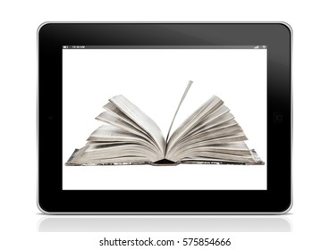 Book and tablet computer. Ebook concept. Reading books on PC tablet