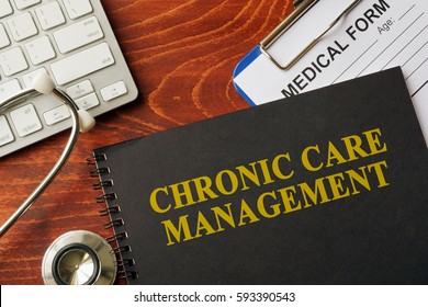 Book With Title Chronic Care Management On A Table. Pain Management Concept.