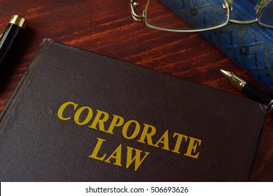 Book With Title Corporate Law On A Table.