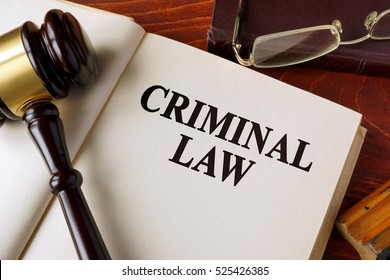 Book With Title Criminal Law On A Table.