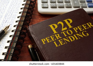 Book With Title P2P Peer To Peer Lending On A Table. 