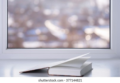 Book at window