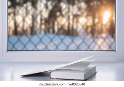 Book at window 
