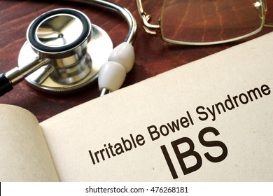 Book With Words Irritable Bowel Syndrome IBS On A Table.