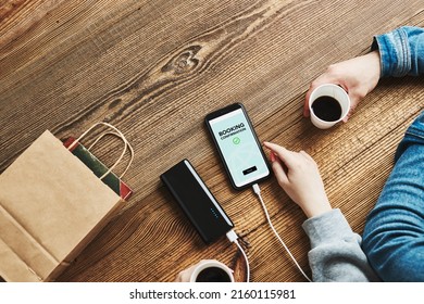 Booking Online. Online Shopping. Paying For Booking. Ordering Service In Online Shop Using Smartphone. Booking Confirmation On Screen. Online Banking. Paying For Shopping While Charging Phone