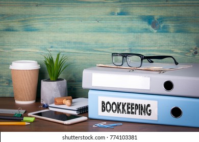 bookkeeping concept. Binders on desk in the office. Business background - Shutterstock ID 774103381