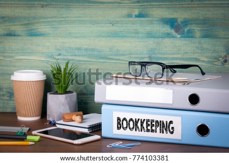bookkeeping concept. Binders on desk in the office. Business background