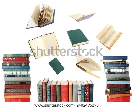 Books flying over stacks on white background