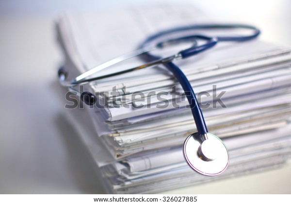 books folder file and stethoscope isolated on\
white background
