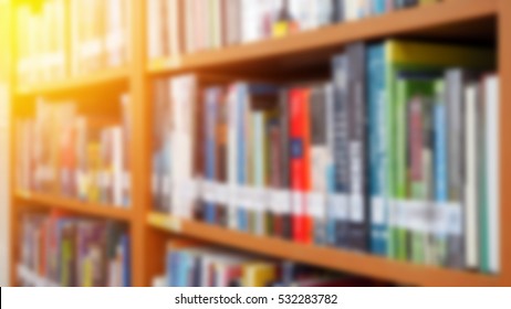 Books On Bookshelf In Library Room Blurred Focus For Education Background