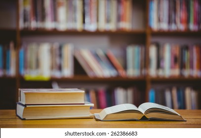 Books On Desk In Library At The Elementary School